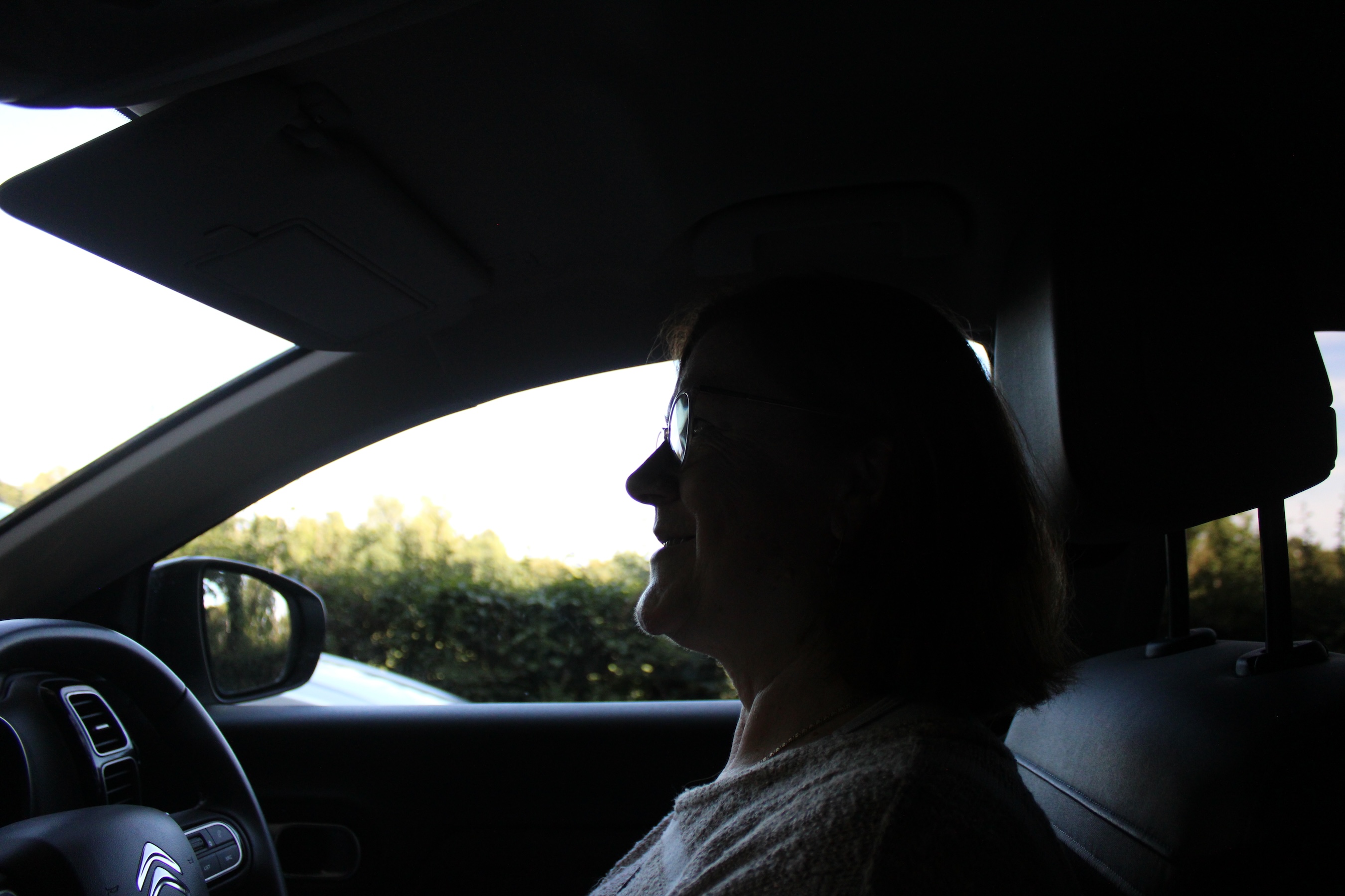 Silhouette of my mom driving